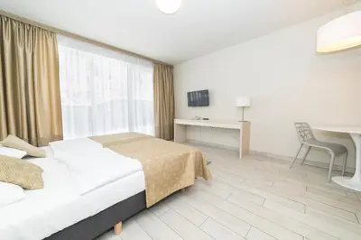 Łóżko lub łóżka w pokoju w obiekcie VacationClub - Solden Apartament 14