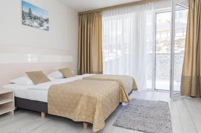 Łóżko lub łóżka w pokoju w obiekcie VacationClub - Solden Apartament 29