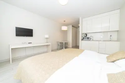 Łóżko lub łóżka w pokoju w obiekcie VacationClub - Solden Apartament 29