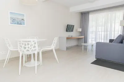 Telewizja i/lub zestaw kina domowego w obiekcie VacationClub - Stubai Apartament 26