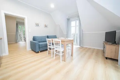 Telewizja i/lub zestaw kina domowego w obiekcie VacationClub – Zdrojowa 7 Apartament 8