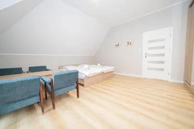 Łóżko lub łóżka w pokoju w obiekcie VacationClub – Zdrojowa 7 Apartament 11