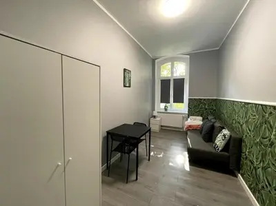 Część wypoczynkowa w obiekcie Duży Apartament - Stare Miasto - 12 osób - 6 łóżek