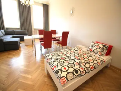 Łóżko lub łóżka w pokoju w obiekcie HAPPYESTATE ul Rynek 20 Old Town