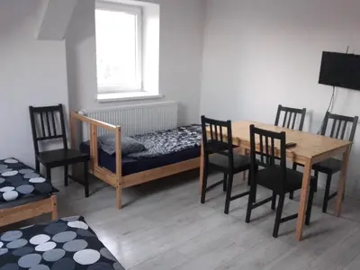 Łóżko lub łóżka w pokoju w obiekcie Noclegi dla firm do 8 osób