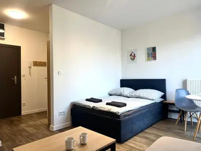 Łóżko lub łóżka w pokoju w obiekcie Przyjaźni 16 Apt 25 - Self Check-In 20h - Lift