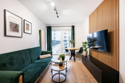 Telewizja i/lub zestaw kina domowego w obiekcie Legnicka Residence 65