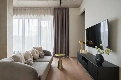Telewizja i/lub zestaw kina domowego w obiekcie River Premium Apartment A
