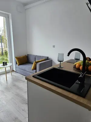 Kuchnia lub aneks kuchenny w obiekcie Rooms Hop To Wrocław