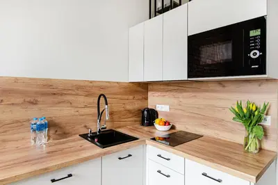 Kuchnia lub aneks kuchenny w obiekcie 3B Loft City Apartment