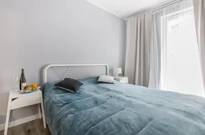 Łóżko lub łóżka w pokoju w obiekcie Superior City Centre Apartment