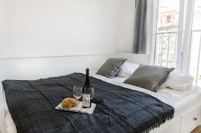 Łóżko lub łóżka w pokoju w obiekcie Grey Apartment! Cozy apartment for two!