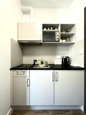 Kuchnia lub aneks kuchenny w obiekcie Przyjaźni 16 Apt 26 - Self Check-In 20h - Lift