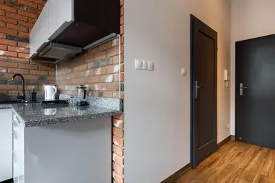 Kuchnia lub aneks kuchenny w obiekcie Close-Central Wroclaw Apartment - Main Rail Station - Kosciuszki 28