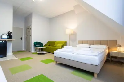 Łóżko lub łóżka w pokoju w obiekcie Moon Apartments Wrocław