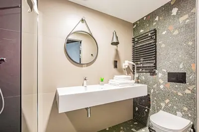 Łazienka w obiekcie VacationClub - Biała Perła Apartament 301