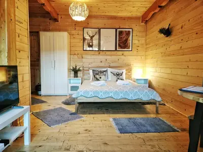 Łóżko lub łóżka w pokoju w obiekcie Pokoje i Domki Na Szlaku