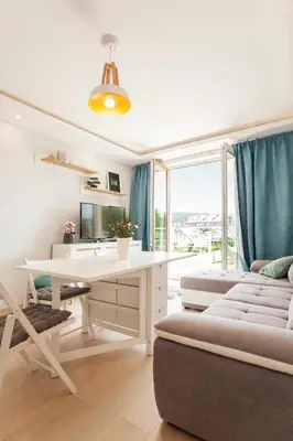 Telewizja i/lub zestaw kina domowego w obiekcie Apartament słoneczny