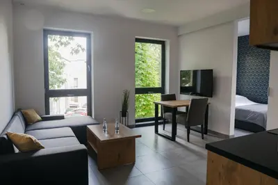 Telewizja i/lub zestaw kina domowego w obiekcie Apartamenty Dworcowa 45
