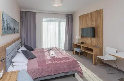 Telewizja i/lub zestaw kina domowego w obiekcie Aparthotel Apartamenty Czarna Góra 310