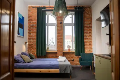 Łóżko lub łóżka w pokoju w obiekcie 5 Porte