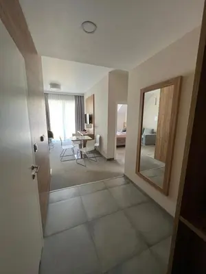 Łóżko lub łóżka w pokoju w obiekcie Aparthotel Apartamenty Czarna Góra 340