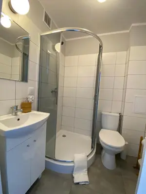 Łazienka w obiekcie APARTAMENT OŚ. ZŁOTE 5F