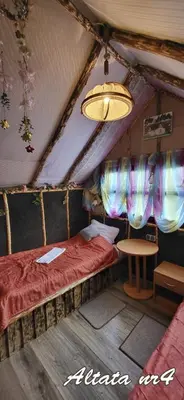 Łóżko lub łóżka w pokoju w obiekcie Altana letnia nr1 - Herbergerówka Agroturystyka na wsi